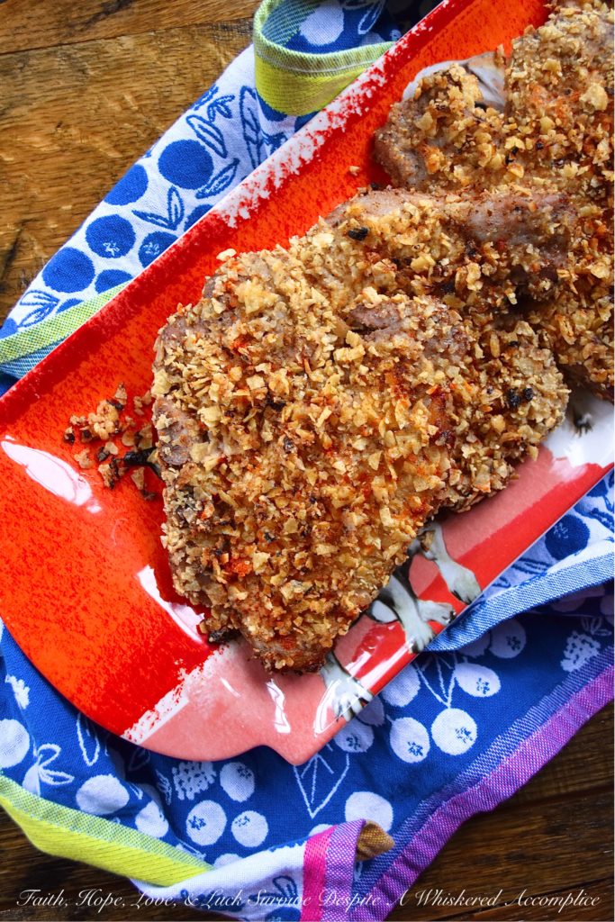 Tortilla Crusted Baked Marinated Pork Chops - We're all looking for a baked pork chop recipe with great flavor. However, more often than not, baked pork chops tend to be dry, rubbery, and disappointing. With this tortilla-crusted marinated pork chop recipe, that won't be a problem. Thanks to the simple overnight marinade, these pork chops come out of the oven super juicy and flavorful. And, the tortilla crust makes them even more amazing.