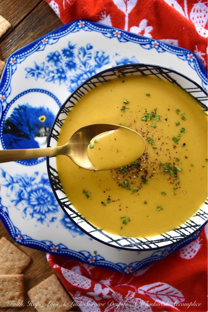 Crockpot Sweet Potato Peanut Butter Curry Soup - It's not often that you can throw a few ingredients into a crockpot or slow-cooker and somehow end up with an amazing recipe. However, with this sweet potato soup recipe, made with sweet curry powder, that definitely happens. The secret to this amazing crockpot soup is blending it with creamy peanut butter after it has been cooked on low heat for several hours. The peanut butter adds richness, creaminess, and just the right amount of nutty flavor.