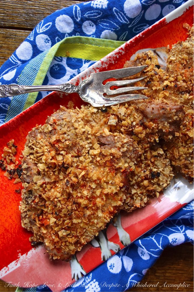 Tortilla Crusted Baked Marinated Pork Chops - We're all looking for a baked pork chop recipe with great flavor. However, more often than not, baked pork chops tend to be dry, rubbery, and disappointing. With this tortilla-crusted marinated pork chop recipe, that won't be a problem. Thanks to the simple overnight marinade, these pork chops come out of the oven super juicy and flavorful. And, the tortilla crust makes them even more amazing.