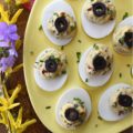 Chunky Sweet & Spicy Black Olive Deviled Eggs - Most deviled eggs have a creamy filling, however, with these deviled eggs, finely chopped black olives give the deviled egg filling a delightful chunky texture. And, once you add a little dijon mustard, honey, crushed red pepper flakes, black pepper, chives, and mayonnaise, I think you'll be quite impressed with the lovely sweet and spicy flavor of these chunky black olive deviled eggs.