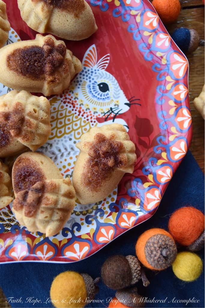 Acorn Madeleines with Cinnamon Sugar - Traditional madeleines require a special baking pan, however, not everyone has the room in their kitchen to store a baking pan that serves only one purpose. For these, cinnamon sugar madeleines, you can use whichever baking tin you have available. And while I used an adorable acorn baking tin, you could certainly use a cupcake tin in its place. After all, appearance isn't everything. No matter what shape or size, I know that you're going to just love the buttery, sweet cinnamon taste of these madeleines.