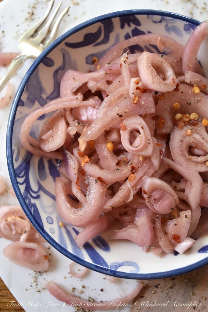 Black Pepper Quick Pickled Red Onions - Pickled red onions are a great zesty addition to almost any meal. Add a few to tacos, potato salad, hamburgers, salsa, corn salad, or even deviled eggs. Honestly, they go great on, or in just, about anything. And, when you add in a healthy dose of freshly ground black pepper, these quick pickled red onions definitely pack a lot of peppery extra zestiness.