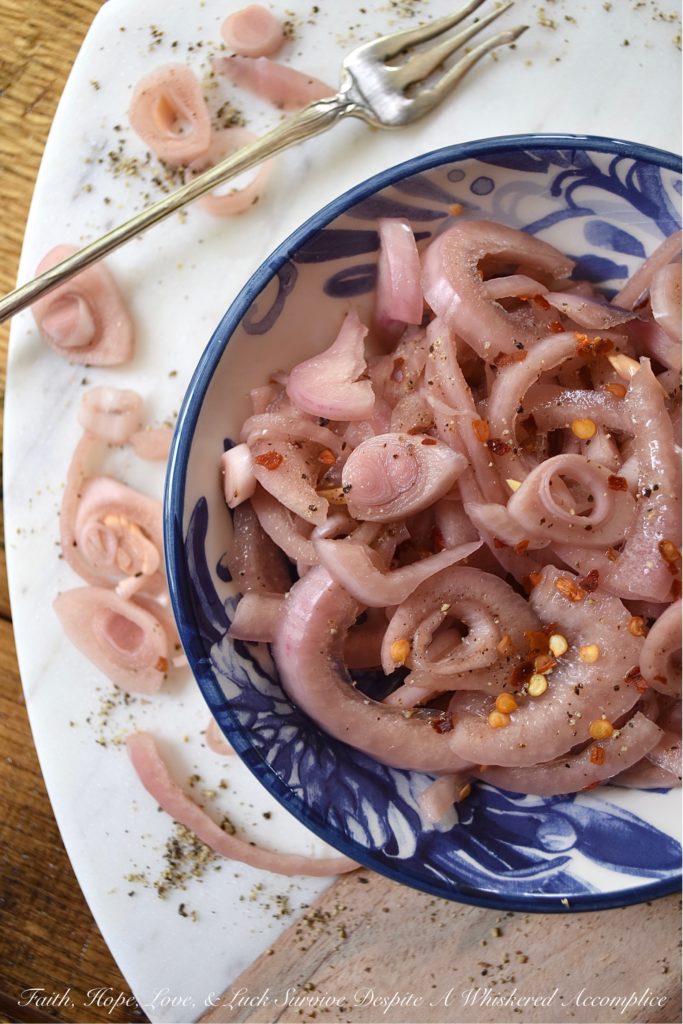 Black Pepper Quick Pickled Red Onions - Pickled red onions are a great zesty addition to almost any meal. Add a few to tacos, potato salad, hamburgers, salsa, corn salad, or even deviled eggs. Honestly, they go great on, or in just, about anything. And, when you add in a healthy dose of freshly ground black pepper, these quick pickled red onions definitely pack a lot of peppery extra zestiness.