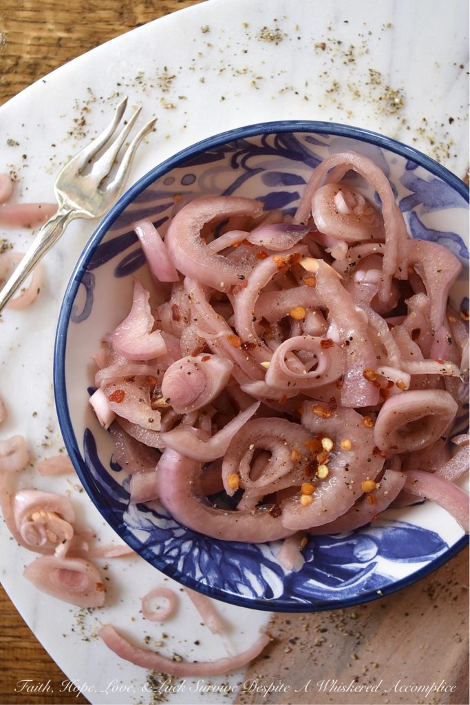 Black Pepper Quick Pickled Red Onions - Pickled red onions are a great zesty addition to almost any meal. Add a few to tacos, potato salad, hamburgers, salsa, corn salad, or even deviled eggs. Honestly, they go great on, or in just, about anything. And, when you add in a healthy dose of freshly ground black pepper, these quick pickled red onions definitely pack a lot of peppery extra zestiness.