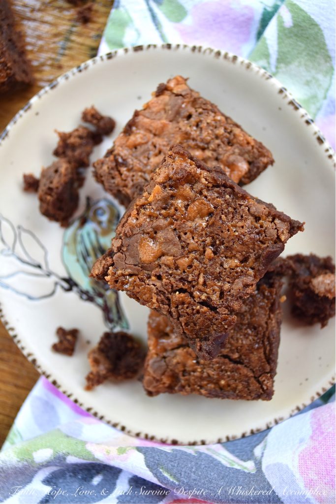 Butterfinger Crackle Top Fudgy Brownies - I'm not quite sure just how one itty bitty candy bar can turn simple homemade brownies into something so amazingly delicious, however, when it comes to these Butterfinger Crackle Top Fudgy Brownies, that itty bitty Butterfinger candy bar is definitely a miracle worker. It almost magically gives these brownies a lovely crackly top, while also making them chewy, fudgy, chocolatey, and just a wee touch salty all at the same time. When it comes to homemade, made from scratch brownies, it doesn’t get much better.