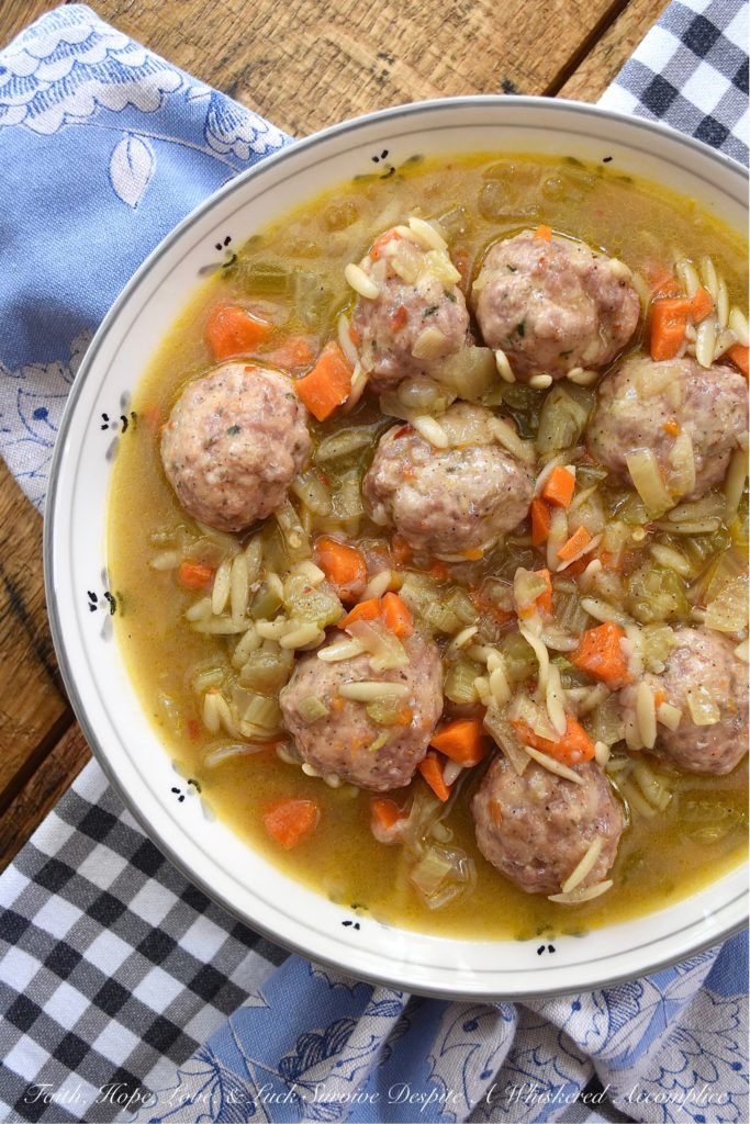 Make-Ahead Spicy Oktoberfest Meatball Stew - This spicy make-ahead meatball stew is the perfect recipe to make on an early autumn weekend to enjoy later in the busy work week. After all, I think that we can all agree, that most soups, stews, and chilis taste better when enjoyed a few days later. This fall stew has a lovely peppery warmth thanks to black pepper and crushed red pepper flakes, and the Oktoberfest lager it contains helps to add a delightful depth of flavor. And in orzo pasta and baked meatballs, and this stew becomes an amazingly flavorful and filling busy weeknight comfort meal.