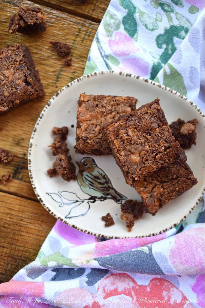 Butterfinger Crackle Top Fudgy Brownies - I'm not quite sure just how one itty bitty candy bar can turn simple homemade brownies into something so amazingly delicious, however, when it comes to these Butterfinger Crackle Top Fudgy Brownies, that itty bitty Butterfinger candy bar is definitely a miracle worker. It almost magically gives these brownies a lovely crackly top, while also making them chewy, fudgy, chocolatey, and just a wee touch salty all at the same time. When it comes to homemade, made from scratch brownies, it doesn’t get much better.