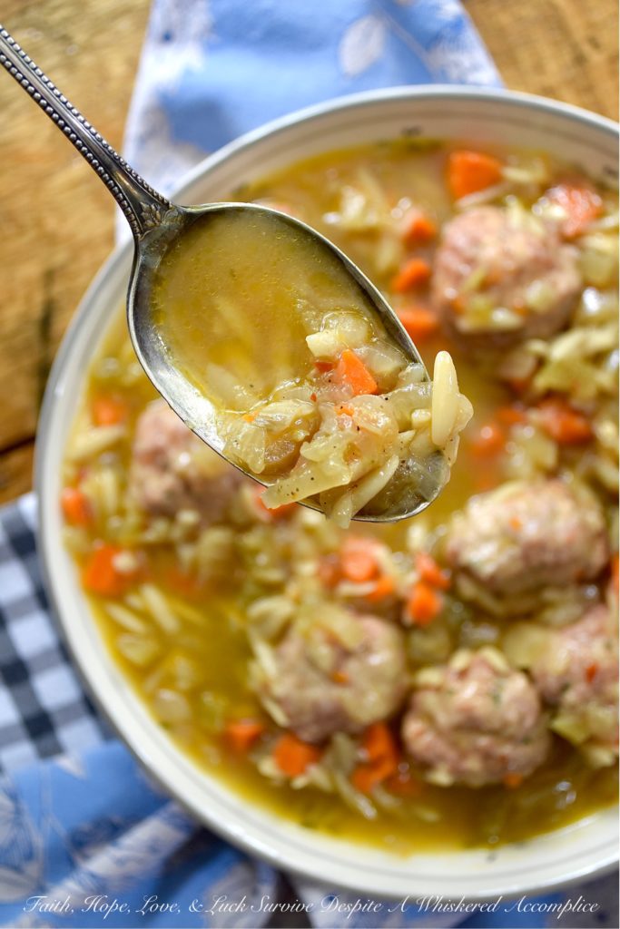 Make-Ahead Spicy Oktoberfest Meatball Stew - This spicy make-ahead meatball stew is the perfect recipe to make on an early autumn weekend to enjoy later in the busy work week. After all, I think that we can all agree, that most soups, stews, and chilis taste better when enjoyed a few days later. This fall stew has a lovely peppery warmth thanks to black pepper and crushed red pepper flakes, and the Oktoberfest lager it contains helps to add a delightful depth of flavor. And in orzo pasta and baked meatballs, and this stew becomes an amazingly flavorful and filling busy weeknight comfort meal.