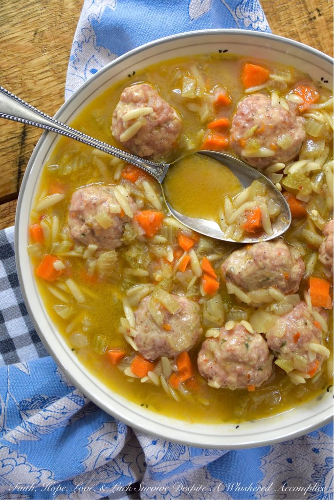 Make-Ahead Spicy Oktoberfest Meatball Stew - This spicy make-ahead meatball stew is the perfect recipe to make on an early autumn weekend to enjoy later in the busy work week. After all, I think that we can all agree, that most soups, stews, and chilis taste better when enjoyed a few days later. This fall stew has a lovely peppery warmth thanks to black pepper and crushed red pepper flakes, and the Oktoberfest lager it contains helps to add a delightful depth of flavor. And in orzo pasta and baked meatballs, and this stew becomes an amazingly flavorful and filling busy weeknight comfort meal.