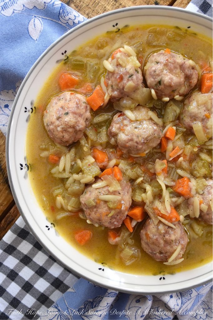 Make-Ahead Spicy Oktoberfest Meatball Stew - This spicy make-ahead meatball stew is the perfect recipe to make on an early autumn weekend to enjoy later in the busy work week. After all, I think that we can all agree, that most soups, stews, and chilis taste better when enjoyed a few days later. This fall stew has a lovely peppery warmth thanks to black pepper and crushed red pepper flakes, and the Oktoberfest lager it contains helps to add a delightful depth of flavor. And in orzo pasta and baked meatballs, and this stew becomes an amazingly flavorful and filling busy weeknight comfort meal.
