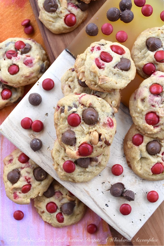 Nutty M&M Peanut Butter Cup Valentine Cookies - Unfortunately, Valentine's Day only comes around once a year. That means, that this may be your only chance, to enjoy these nutty peanut butter cup cookies chock-full of festive holiday M&M's. So, if you love festive holiday-themed cookies, make sure to share a few of these sweet, over-loaded with goodness, irresistible M&M cookies with your special Valentine.