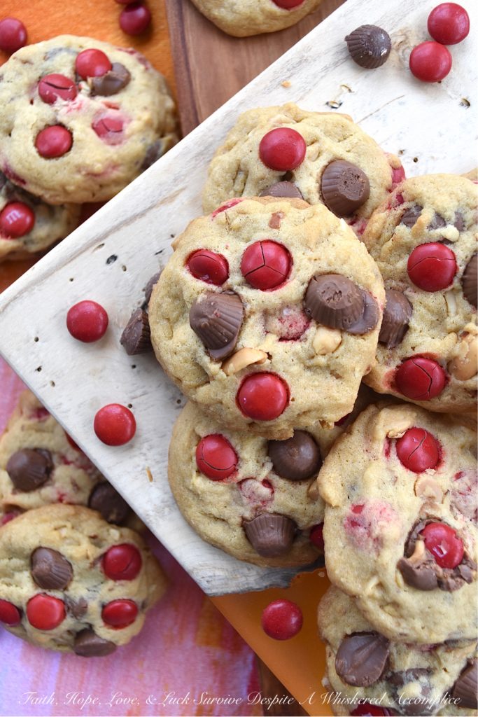 Nutty M&M Peanut Butter Cup Valentine Cookies - Unfortunately, Valentine's Day only comes around once a year. That means, that this may be your only chance, to enjoy these nutty peanut butter cup cookies chock-full of festive holiday M&M's. So, if you love festive holiday-themed cookies, make sure to share a few of these sweet, over-loaded with goodness, irresistible M&M cookies with your special Valentine.