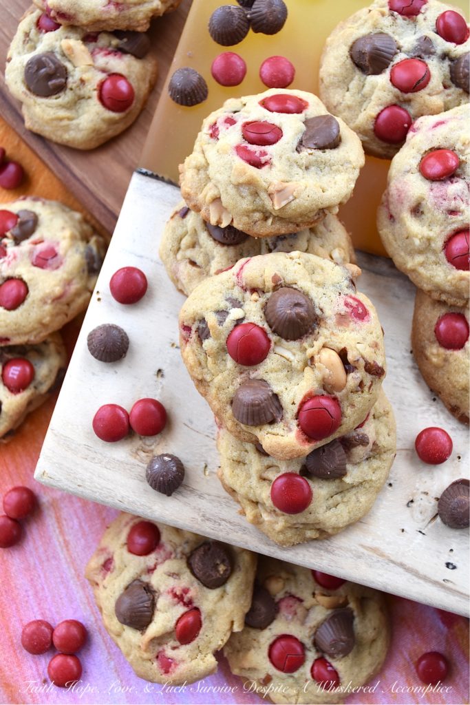 Nutty M&M Peanut Butter Cup Valentine Cookies - Unfortunately, Valentine's Day only comes around once a year. That means, that this may be your only chance, to enjoy these nutty peanut butter cup cookies chock-full of festive holiday M&M's. So, if you love festive holiday-themed cookies, make sure to share a few of these sweet, over-loaded with goodness, irresistible M&M cookies with your special Valentine.