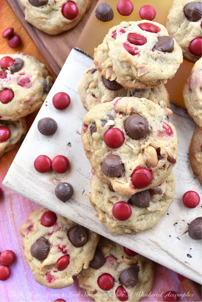 Nutty M&M Peanut Butter Cup Valentine Cookies - Unfortunately, Valentine's Day only comes around once a year. That means, that this may be your only chance, to enjoy these nutty peanut butter cup cookies chock-full of festive holiday M&M's. So, if you love festive holiday-themed cookies, make sure to share a few of these sweet, over-loaded with goodness, irresistible M&M cookies with your special Valentine.