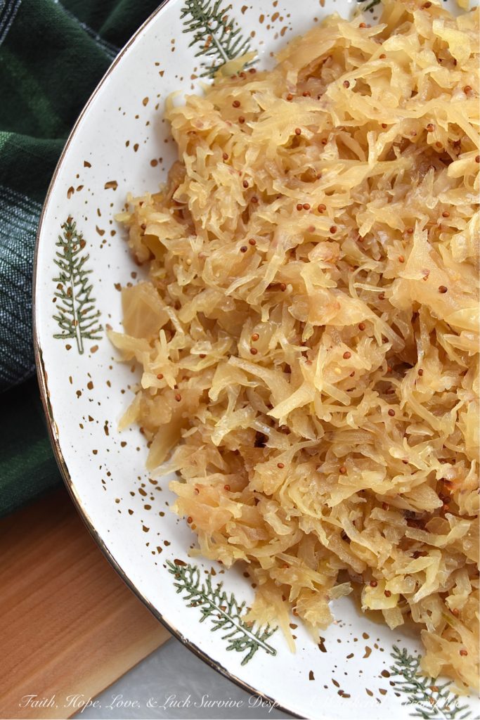 Oven-Roasted Sauerkraut with Beer - When it comes to a great football menu, you can never go wrong with sauerkraut. Either by itself as a side dish, or used as a condiment on your favorite hot dogs or brats, sauerkraut is always a delicious game day addition. This oven-roasted sauerkraut with beer, using only five simple ingredients, is guaranteed to be a winning touchdown recipe at your next game-day gathering.