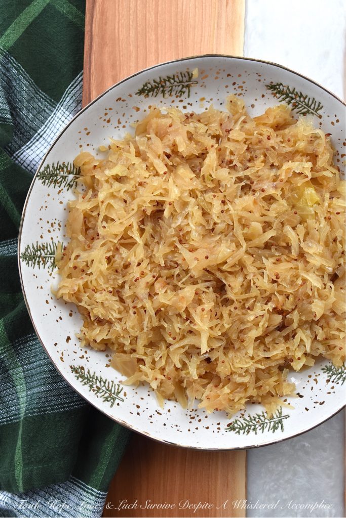 Oven-Roasted Sauerkraut with Beer - When it comes to a great football menu, you can never go wrong with sauerkraut. Either by itself as a side dish, or used as a condiment on your favorite hot dogs or brats, sauerkraut is always a delicious game day addition. This oven-roasted sauerkraut with beer, using only five simple ingredients, is guaranteed to be a winning touchdown recipe at your next game-day gathering.