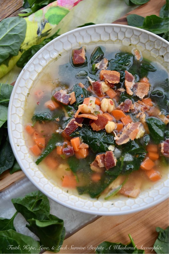 Spinach & Chickpea Soup with Bacon & Beer - This flavorful soup is a great way to put a healthy meal on the table, while still indulging in a guilty pleasure or two at the same time. The carrots, fresh spinach, and chickpeas work so well with the beer used in this soup's broth and the crispy bacon garnish adds just the right amount of salty deliciousness that's almost impossible to resist.