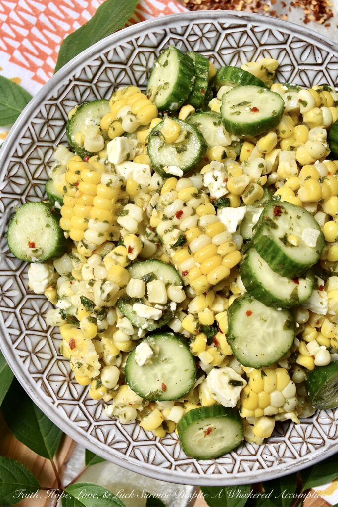 Greek Summer Corn & Cucumber Salad with Feta - You can only eat corn on the cob so many times during the hot summer months before it becomes just a wee bit boring and mundane. This Greek corn and cucumber salad with feta cheese will help to break the monotony. It's fresh, holds up well in hot weather, uses ingredients that are readily available during the steamy summer months, and it is quick and easy to throw together on a busy weekday or a lazy weekend. When it comes to fresh corn, don't be afraid to switch things up this summer with this tasty vegetable side salad.