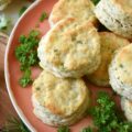 Buttery Fresh Herb Breakfast Biscuits - Is your herb garden overflowing with parsley, oregano, chives, rosemary, or basil? If so, these buttery biscuits, made with fresh herbs, are just what you need to bake for breakfast. They're flaky, warm, tender, fluffy, super-buttery, and even more amazing when served topped with your favorite fruity jam, thick preserves, or sweet jelly.