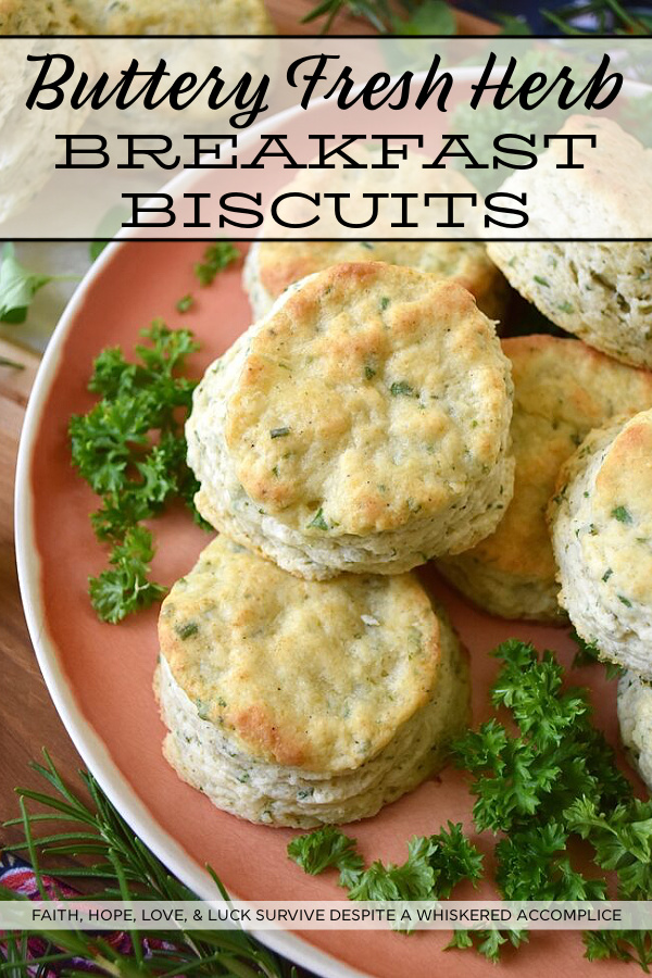 Buttery Fresh Herb Breakfast Biscuits - Is your herb garden overflowing with parsley, oregano, chives, rosemary, or basil? If so, these buttery biscuits, made with fresh herbs, are just what you need to bake for breakfast. They're flaky, warm, tender, fluffy, super-buttery, and even more amazing when served topped with your favorite fruity jam, thick preserves, or sweet jelly.