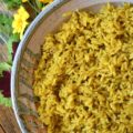 Simple Weeknight Stovetop Turmeric Rice - Instead of making plain, monotomous, and unexciting jasmine rice on a busy weeknight, why not make this flavorsome simple stovetop side dish instead? This savory and aromatic turmeric rice is a simple way to improve upon any weeknight meal with just a few ingredients.