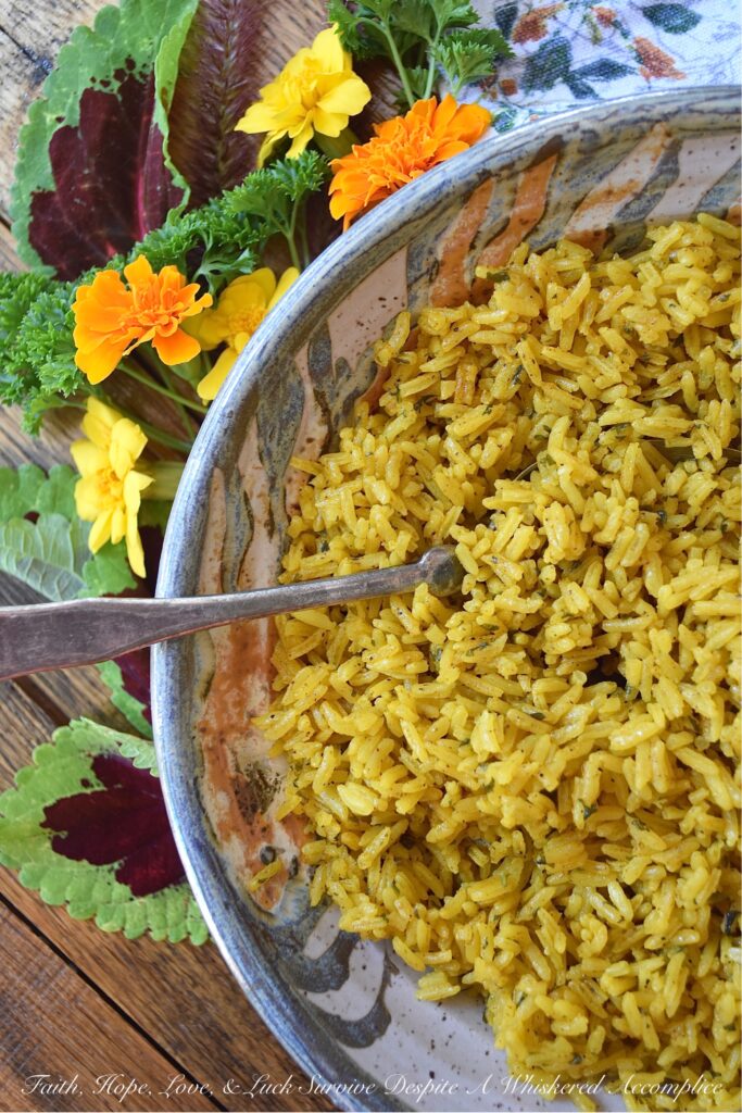 Simple Weeknight Stovetop Turmeric Rice - Instead of making plain, monotomous, and unexciting jasmine rice on a busy weeknight, why not make this flavorsome simple stovetop side dish instead? This savory and aromatic turmeric rice is a simple way to improve upon any weeknight meal with just a few ingredients.