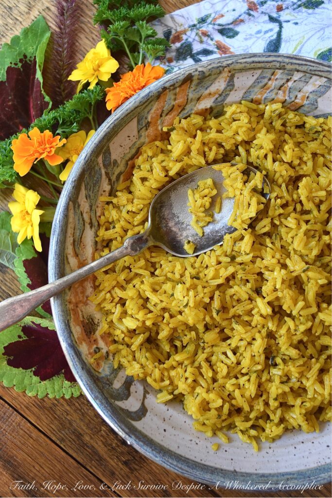 Simple Weeknight Stovetop Turmeric Rice - Instead of making plain, monotomous, and unexciting jasmine rice on a busy weeknight, why not make this flavorsome simple stovetop side dish instead? This savory and aromatic turmeric rice is a simple way to improve upon any weeknight meal with just a few ingredients.