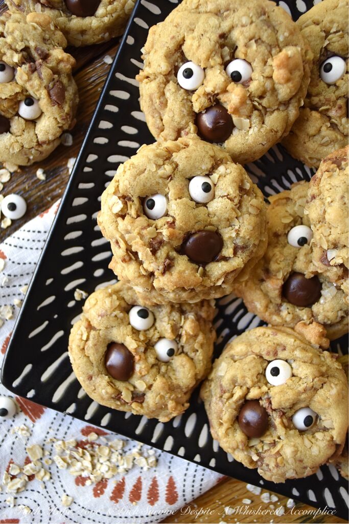 Oatmeal Chocolate Toffee Ghost Cookies - Halloween is the perfect time of year to make a "boo"tiful sweet treat for your family and friends. These adorable ghost cookies are filled with chewy oatmeal and crunchy milk chocolate-coated toffee. Once these fa"boo"lous HEATH toffee bar cookies are garnished with edible candy eyeballs and a chocolate chip mouth, there's simply no way to resist their holiday charm.