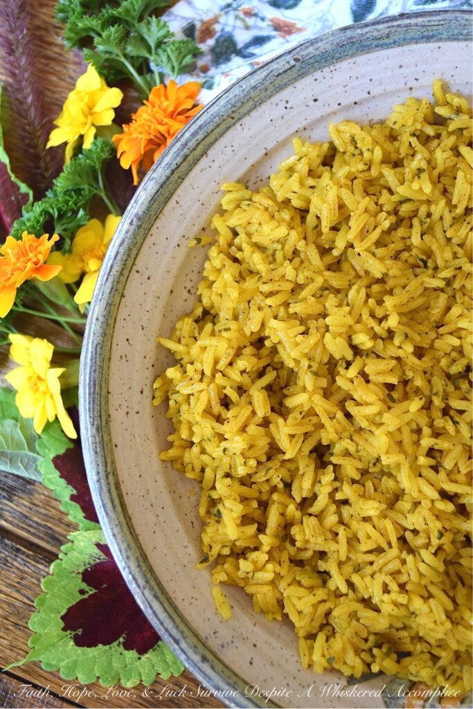 Simple Weeknight Stovetop Turmeric Rice - Instead of making plain, monotomous, and unexciting jasmine rice on a busy weeknight, why not make this flavorsome simple stovetop side dish instead? This savory and aromatic turmeric rice is a simple way to improve upon any weeknight meal with just a few ingredients.