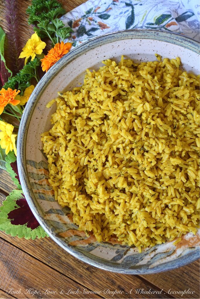 Simple Weeknight Stovetop Turmeric Rice - Instead of making plain, monotomous, and unexciting jasmine rice on a busy weeknight, why not make this flavorsome simple stovetop side dish instead? This savory and aromatic turmeric rice is a simple way to improve upon any weeknight meal with just a few ingredients.