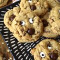 Oatmeal Chocolate Toffee Ghost Cookies - Halloween is the perfect time of year to make a "boo"tiful sweet treat for your family and friends. These adorable ghost cookies are filled with chewy oatmeal and crunchy milk chocolate-coated toffee. Once these fa"boo"lous HEATH toffee bar cookies are garnished with edible candy eyeballs and a chocolate chip mouth, there's simply no way to resist their holiday charm.