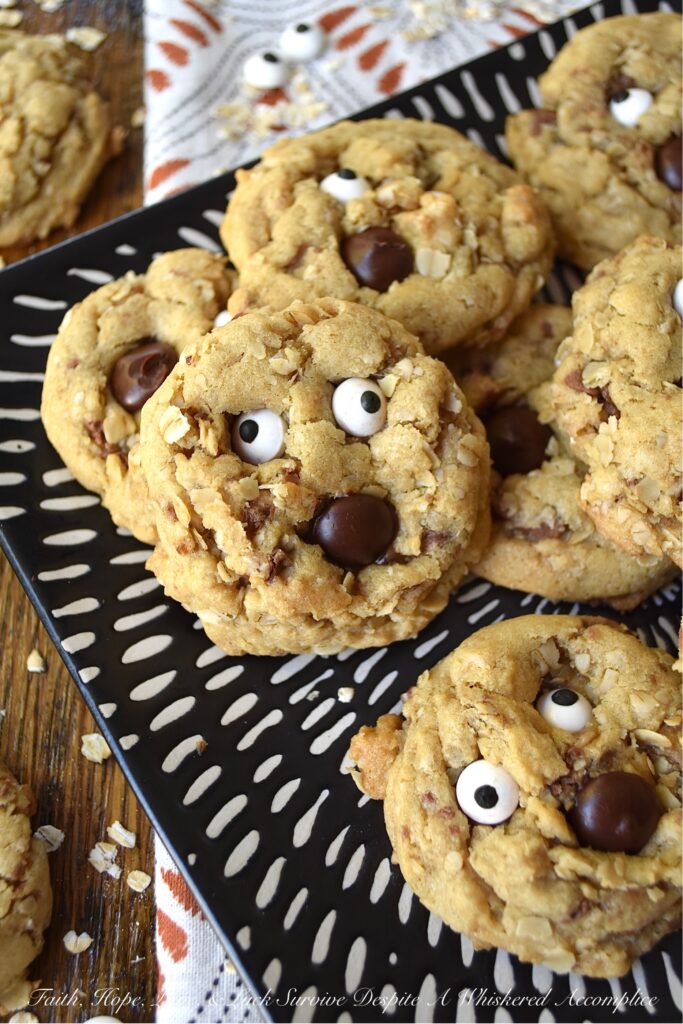 Oatmeal Chocolate Toffee Ghost Cookies - Halloween is the perfect time of year to make a "boo"tiful sweet treat for your family and friends. These adorable ghost cookies are filled with chewy oatmeal and crunchy milk chocolate-coated toffee. Once these fa"boo"lous HEATH toffee bar cookies are garnished with edible candy eyeballs and a chocolate chip mouth, there's simply no way to resist their holiday charm.
