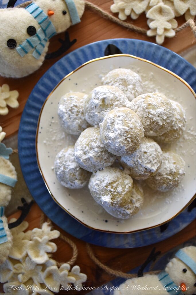 Nut-Free Snowball Cookies - Pecan Sandies, Russian Tea Cookies, Mexican Wedding Cookies, and Snowball Cookies all have one thing in common; they almost always contain ground or chopped pecans. For those severely allergic to nuts, this can be an extremely dangerous thing. Instead of using pecans, this recipe uses roasted salted pumpkin seeds, making it safe for those with nut allergies to finally enjoy these crumbly, sweet, and powdery traditional holiday cookies.