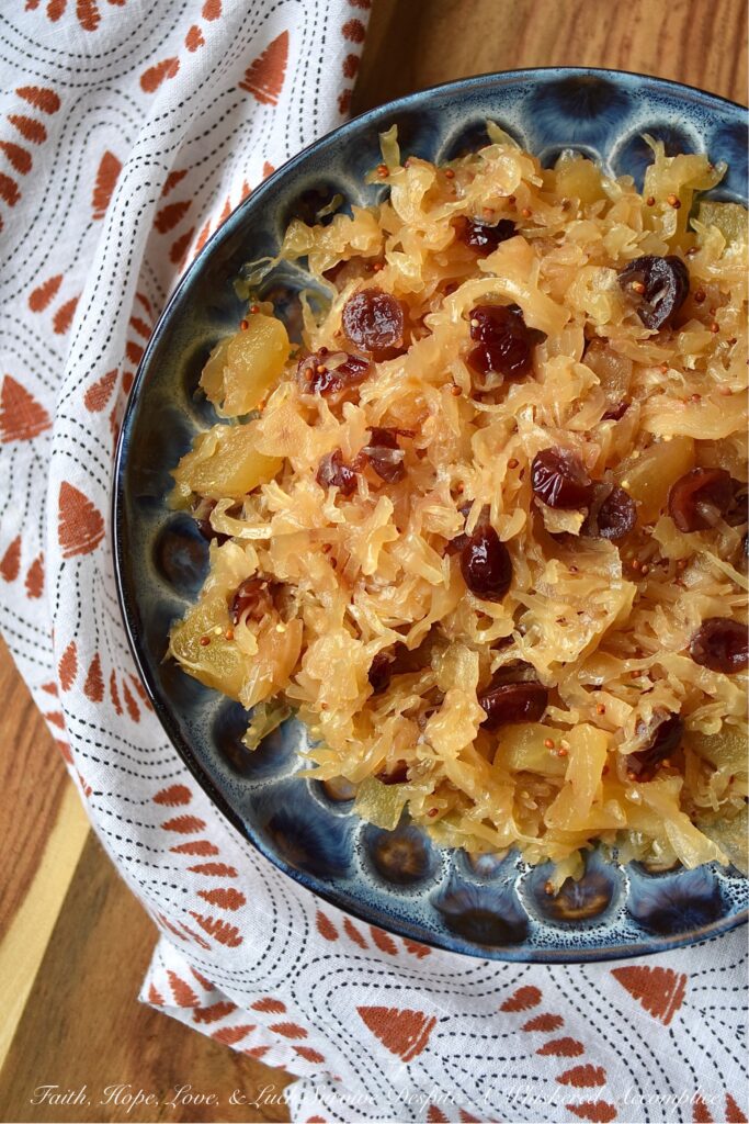 Apple & Cranberry Oven-Roasted Sauerkraut - This sweet and sour one-dish recipe is one that will help you navigate mealtime on almost any busy weeknight. Not only is it the perfect side dish for any type of pork or sausage, but it also pairs extremely well with mashed potatoes. And, thanks to an apple, a few dried sweetened cranberries, and a touch of brown sugar, this oven-roasted sauerkraut has just the right amount of sweetness to help balance out its naturally sour flavor.