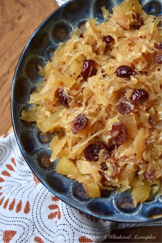 Apple & Cranberry Oven-Roasted Sauerkraut - This sweet and sour one-dish recipe is one that will help you navigate mealtime on almost any busy weeknight. Not only is it the perfect side dish for any type of pork or sausage, but it also pairs extremely well with mashed potatoes. And, thanks to an apple, a few dried sweetened cranberries, and a touch of brown sugar, this oven-roasted sauerkraut has just the right amount of sweetness to help balance out its naturally sour flavor.
