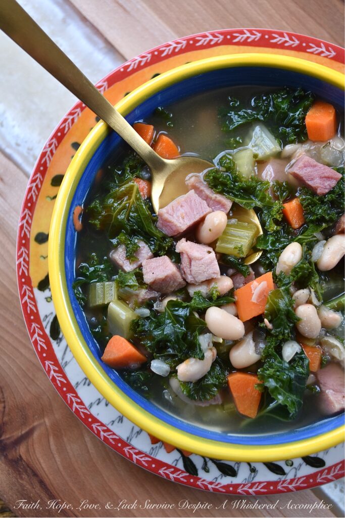 White Bean & Ham Soup with Kale (Ham Steak) - The next time you're tempted to buy a huge bag of chopped fresh kale leaves at your local market, don't hold back. This white bean and ham soup will turn that simple bag of kale into a healthy meal your entire family will love, with the help of a ham steak, vegetables, canned white beans, and a few other simple ingredients.