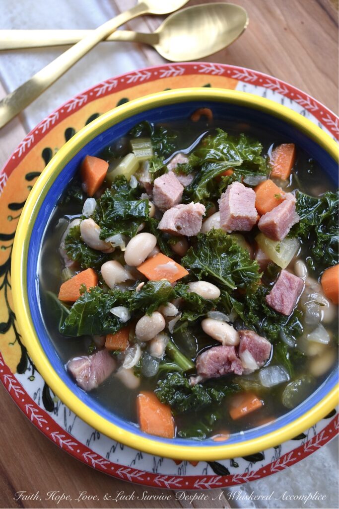White Bean & Ham Soup with Kale (Ham Steak) - The next time you're tempted to buy a huge bag of chopped fresh kale leaves at your local market, don't hold back. This white bean and ham soup will turn that simple bag of kale into a healthy meal your entire family will love, with the help of a ham steak, vegetables, canned white beans, and a few other simple ingredients.