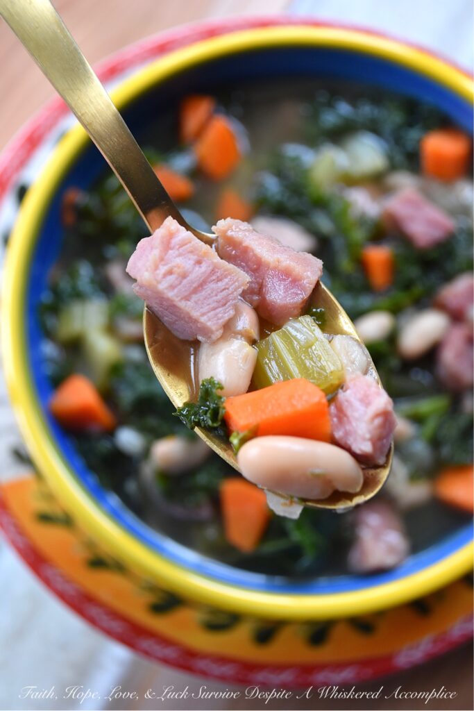 White Bean & Ham Soup with Kale (Ham Steak) - The next time you're tempted to buy a huge bag of chopped fresh kale leaves at your local market, don't hold back. This white bean and ham soup will turn that simple bag of kale into a healthy meal your entire family will love, with the help of a ham steak, vegetables, canned white beans, and a few other simple ingredients.