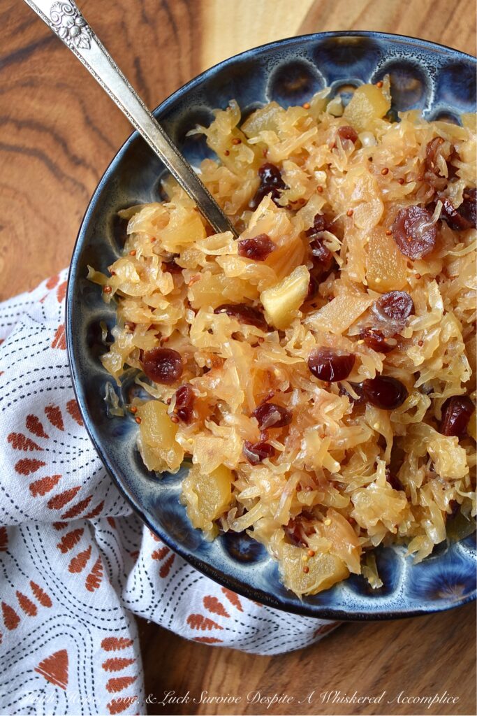 Apple & Cranberry Oven-Roasted Sauerkraut - This sweet and sour one-dish recipe is one that will help you navigate mealtime on almost any busy weeknight. Not only is it the perfect side dish for any type of pork or sausage, but it also pairs extremely well with mashed potatoes. And, thanks to an apple, a few dried sweetened cranberries, and a touch of brown sugar, this oven-roasted sauerkraut has just the right amount of sweetness to help balance out its naturally sour flavor.