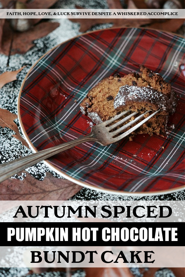 Autumn Spiced Pumpkin Hot Chocolate Bundt Cake - This is the perfect pumpkin Bundt cake to serve alongside a steaming mug of hot chocolate. First, it's lightly spiced with cinnamon and ground chipotle, then it's studded with mini semi-sweet chocolate chips, and finally, it's dusted with cocoa and powdered sugar to make it absolutely gorgeous. This has got to be my personal favorite way to celebrate all things pumpkin spice.
