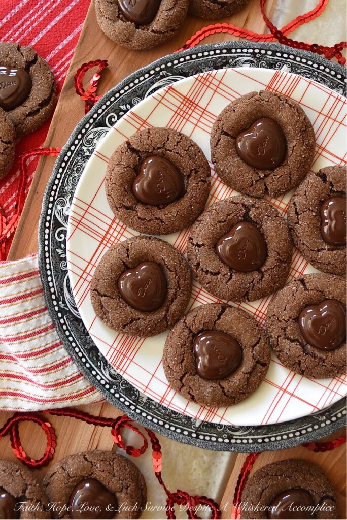 Heart-Melting Chocolate Espresso Cookies - If you're looking for a chocolate cookie that will truly melt your heart this Valentine's Day, then you're really going to fall in love with these Heart-Melting Chocolate Espresso Cookies. They're chocolaty, crunchy, and sweet, with a lovely espresso flavor. And for the finishing touch, each cookie is topped with a heart-shaped chocolate that literally melts into it. How can your heart not totally melt over these cookies?