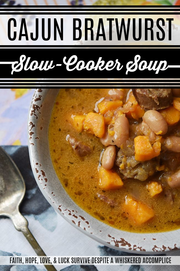 Cajun Bratwurst Slow-Cooker Soup - This bratwurst slow-cooker soup, containing cannellini beans and sweet potatoes, has just the right amount of Cajun kick with just a touch of sweetness. A can of light coconut milk also helps give this slow-cooked soup a hint of richness without making it too fattening.