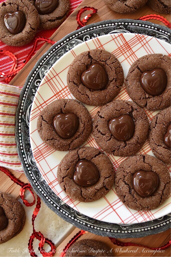 Heart-Melting Chocolate Espresso Cookies - If you're looking for a chocolate cookie that will truly melt your heart this Valentine's Day, then you're really going to fall in love with these Heart-Melting Chocolate Espresso Cookies. They're chocolaty, crunchy, and sweet, with a lovely espresso flavor. And for the finishing touch, each cookie is topped with a heart-shaped chocolate that literally melts into it. How can your heart not totally melt over these cookies?