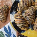 Chocolate Crescent Rolls with Baileys & Sea Salt - When you wake up and find yourself in need of a sweet treat but don't feel like spending all morning in the kitchen, these chocolate crescent rolls are just what you need. Store-bought crescent rolls are filled with chopped chocolate, baked until golden brown, and then drizzled with both additional melted chocolate and a sweet Baileys Irish Cream glaze. A little sprinkle of sea salt is the final and flavorful touch to help make this breakfast, brunch, or dessert treat simply irresistible.