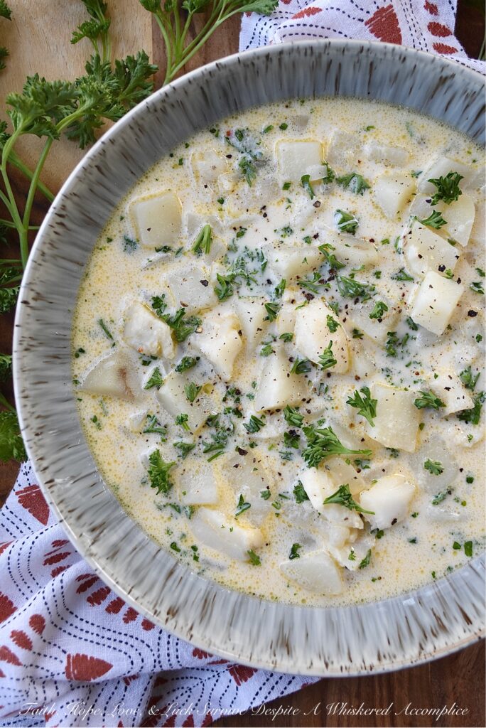 Fish & Potato Chowder with Irish Whiskey - This one-pot fish chowder is an easy-to-make recipe that uses bite-sized chunks of skinless boneless cod, peeled red potatoes, and a touch of Irish whiskey for added flavor. For the broth, a can of evaporated milk, a little bit of half and half, and a few tablespoons of butter help give this chowder a lovely creaminess, without making it over-the-top rich. This is a meal you can easily serve for Fish Friday, St. Patrick's Day, or even on a normal hectic weekday evening.