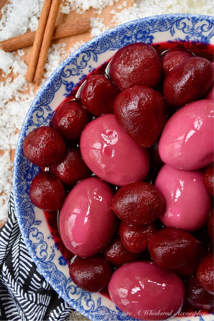 Easy 4-Ingredient Pickled Eggs with Beets - If you're a true pickled egg devotee, this easy 4-ingredient recipe is about to make all of your pickled egg dreams come true. Instead of cooking, peeling, and pickling beets each time you want to enjoy a few pickled eggs, simply use a few jars of store-bought whole or sliced pickled beets instead. For added flavor, add a few cinnamon sticks and a bit of sea salt. These pickled hard-boiled eggs are easy to prepare, absolutely delicious, and won't leave you with beet-stained hands.