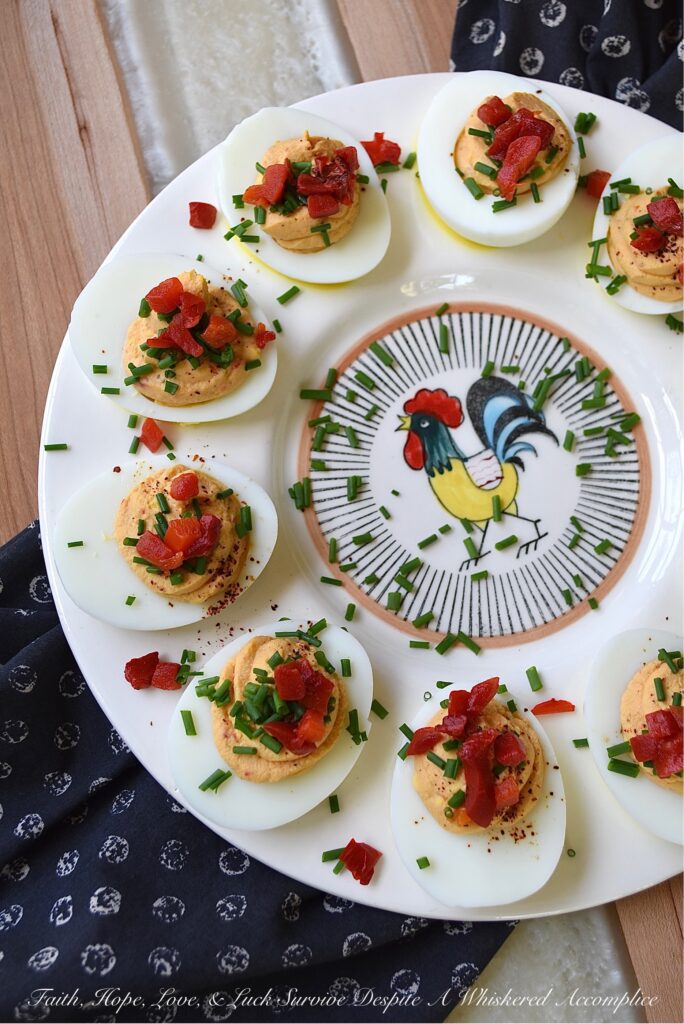 Sweet Pimento Deviled Eggs - Liven up traditional deviled eggs with the addition of chives and diced pimentos. A little bit of granulated sugar and balsamic vinegar also helps to add sweetness and flavor. For sure, these colorful and sweet deviled eggs with pimento, are bound to be a huge hit at your next holiday, barbecue, picnic, or cookout gathering.
