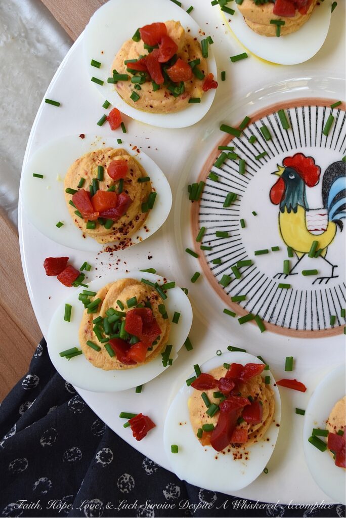 Sweet Pimento Deviled Eggs - Liven up traditional deviled eggs with the addition of chives and diced pimentos. A little bit of granulated sugar and balsamic vinegar also helps to add sweetness and flavor. For sure, these colorful and sweet deviled eggs with pimento, are bound to be a huge hit at your next holiday, barbecue, picnic, or cookout gathering.
