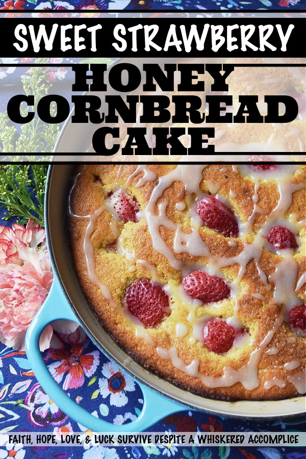 Sweet Strawberry Honey Cornbread Cake - This honey-flavored cast iron cornbread cake is full of sweet strawberries and topped with just the right amount of powdered sugar drizzle. Whether you choose to serve it for breakfast alongside a banana or additional sliced strawberries, or for dessert alongside fresh whipped cream or a scoop of ice cream, I guarantee that you'll fall absolutely in love with this sweet cornbread after the very first bite.