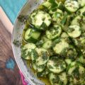 Spicy Mojito Cucumber Salad - Everyone needs a quick, affordable, refreshing summer salad recipe that can be made last minute with minimal effort involved. This crunchy, spicy mojito cucumber salad, tossed in a simple mojito-inspired dressing, is the perfect summertime recipe. It takes less than five minutes to make, requires only a few inexpensive ingredients, and can withstand the hottest summer temps.